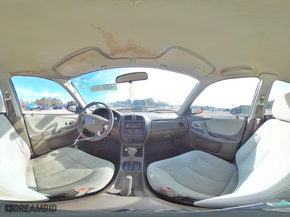 2000 Mazda Protege DX with VIN JM1BJ2224Y0250062, listed as a Copart auction lot 43661005 with 0 mi miles and Salvage Title. Bid and sale history available at carsss.com. Image 13.
