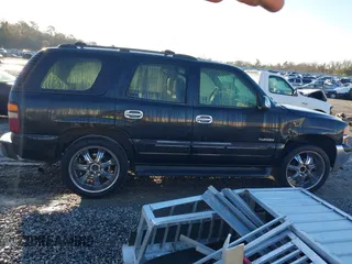 2002 GMC Yukon SLT with VIN 1GKEC13Z42J245768, listed as a IAAI auction lot 41769081 with 389,189 mi miles. Bid and sale history available at carsss.com. Image 13.