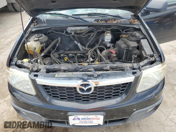 2010 Mazda Tribute Grand Touring with VIN 4F2CY0C78AKM03177, listed as a Copart auction lot 66729164 with 75,400 mi miles and Salvage Title. Bid and sale history available at carsss.com. Image 12.