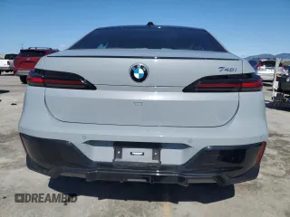 2023 BMW 7 Series 740i with VIN WBA23EH02PCL92695, listed as a Copart auction lot 49352065 with 11,758 mi miles and Salvage title. Bid and sale history available at DreamBid. Image 6.
