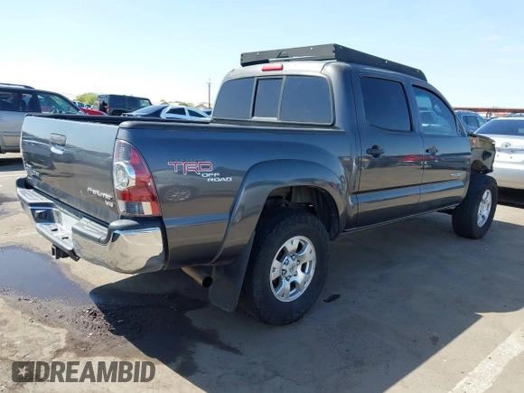 2011 Toyota Tacoma PreRunner with VIN 3TMJU4GN4BM114858, listed as a IAAI auction lot 41976639 with 296,849 mi miles and . Bid and sale history available at DreamBid. Image 4.