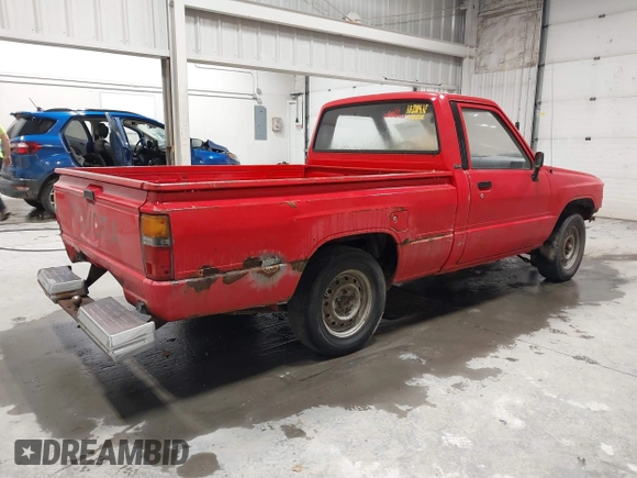 1987 Toyota Pickup with VIN JT4RN50R8H0221202, listed as a IAAI auction lot 40500429 with 304,229 mi miles and . Bid and sale history available at DreamBid. Image 4.