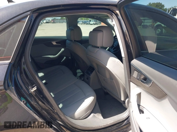 2019 Audi A4 Premium z VIN WAUGMAF49KN014940, wystawiony jako IAAI lot #41962088 z przebiegiem 69 099 mil mil oraz . Historia ofert i sprzedaży dostępna na DreamBid. Obrazek 8.