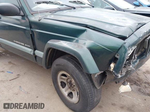 2000 Jeep Cherokee with VIN 1J4FT48S6YL102373, listed as a IAAI auction lot 41685817 with 214,106 mi miles and . Bid and sale history available at DreamBid. Image 12.
