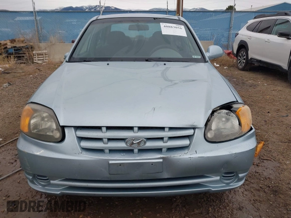 2003 Hyundai Accent GL z VIN KMHCG45C43U465523, wystawiony jako IAAI lot #40883056 z przebiegiem 95 770 mil mil oraz . Historia ofert i sprzedaży dostępna na DreamBid. Obrazek 12.