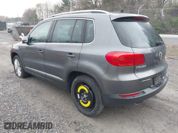 2013 Volkswagen Tiguan SE with VIN WVGAV7AX9DW547633, listed as a IAAI auction lot 42009704 with 51,826 mi miles and . Bid and sale history available at DreamBid. Image 3.