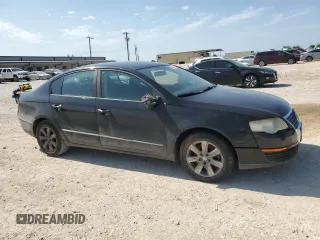 2007 Volkswagen Passat with VIN WVWJK73CX7P065789, listed as a Copart auction lot 56332135 with 137,400 mi miles and Salvage title. Bid and sale history available at DreamBid. Image 4.