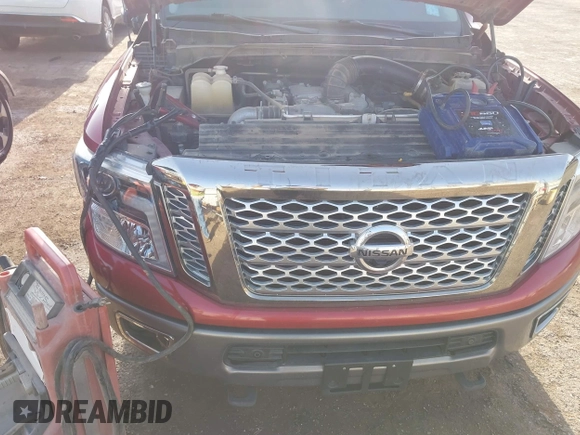 2017 Nissan Titan Pro-4X z VIN 1N6BA1F43HN562377, wystawiony jako IAAI lot #41786607 z przebiegiem 95 207 mil mil oraz . Historia ofert i sprzedaży dostępna na DreamBid. Obrazek 18.