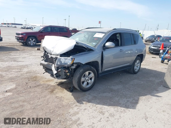 2016 Jeep Compass Latitude with VIN 1C4NJCEA7GD675742, listed as a IAAI auction lot 41877787 with 107,749 mi miles and . Bid and sale history available at DreamBid. Image 2.