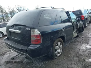 2005 Acura MDX with VIN 2HNYD18215H555605, listed as a IAAI auction lot 41351628 with 210,858 mi miles. Bid and sale history available at carsss.com. Image 4.
