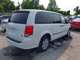 2011 Dodge Grand Caravan z VIN 2D4JN1AG3BR789019, wystawiony jako IAAI lot #42391737 z przebiegiem 128 136 mil mil oraz . Historia ofert i sprzedaży dostępna na DreamBid. Obrazek 4.