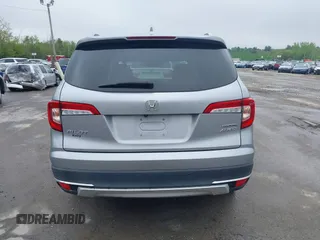 2020 Honda Pilot Touring 8-Passenger z VIN 5FNYF6H91LB042626, wystawiony jako IAAI lot #42249440 z przebiegiem 57 429 mil mil oraz . Historia ofert i sprzedaży dostępna na DreamBid. Obrazek 16.