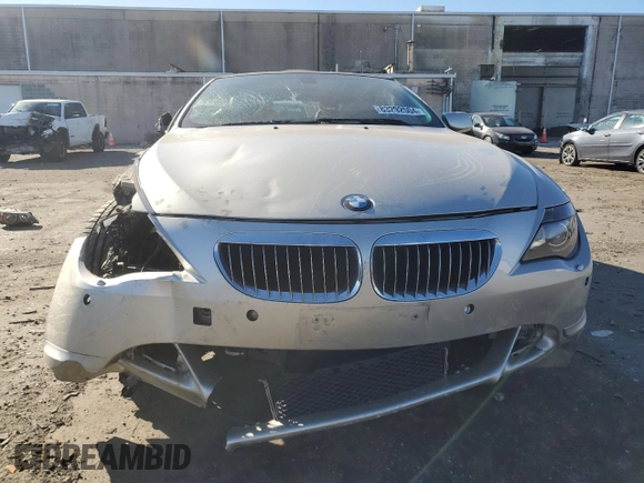 2006 BMW 6 Series 650Ci z VIN WBAEK13416CN76818, wystawiony jako Copart lot #83292504 z przebiegiem 94 653 mil mil oraz Czysty tytuł • Clean title. Historia ofert i sprzedaży dostępna na DreamBid. Obrazek 5.