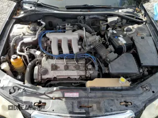 2002 Mazda Millenia z VIN JM1TA221421729790, wystawiony jako Copart lot #84460794 z przebiegiem 68 102 mil mil oraz Szkody całkowita. Historia ofert i sprzedaży dostępna na DreamBid. Obrazek 11.