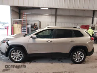 2014 Jeep Cherokee Limited z VIN 1C4PJMDS9EW276552, wystawiony jako IAAI lot #41826505 z przebiegiem 113 181 mil mil oraz . Historia ofert i sprzedaży dostępna na DreamBid. Obrazek 14.
