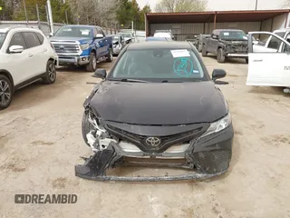 2019 Toyota Camry LE z VIN 4T1B11HK6KU805252, wystawiony jako IAAI lot #41787833 z przebiegiem 85 196 mil mil oraz . Historia ofert i sprzedaży dostępna na DreamBid. Obrazek 13.