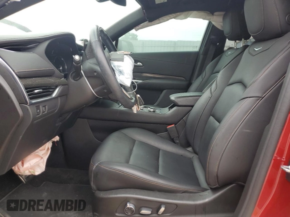 2021 Cadillac XT4 FWD Sport with VIN 1GYFZER49MF082391, listed as a Copart auction lot 56256804 with 24,415 mi miles and Salvage Title. Bid and sale history available at DreamBid. Image 7.