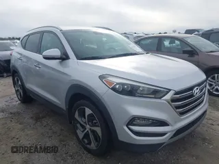 2016 Hyundai Tucson Limited with VIN KM8J33A26GU038537, listed as a IAAI auction lot 41704372 with 106,112 mi miles. Bid and sale history available at carsss.com. Image 1.