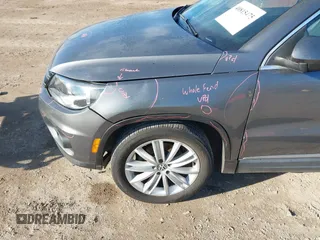 2012 Volkswagen Tiguan SEL with VIN WVGAV7AX2CW000962, listed as a IAAI auction lot 40815475 with 162,859 mi miles and . Bid and sale history available at DreamBid. Image 12.