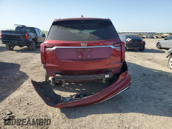 2020 Cadillac XT6 FWD Premium Luxury z VIN 1GYKPCRSXLZ101003, wystawiony jako Copart lot #51844525 z przebiegiem 115 061 mil mil oraz Szkoda całkowita • Salvage title. Historia ofert i sprzedaży dostępna na DreamBid. Obrazek 6.