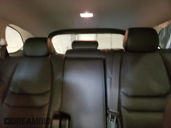 2023 Mazda CX-9 Touring Plus with VIN JM3TCBAY4P0653310, listed as a Copart auction lot 42734995 with 18,236 mi miles and Salvage title. Bid and sale history available at DreamBid. Image 10.