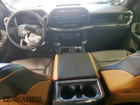 2023 Ford F-150 XL with VIN 1FTEW1CP7PKD02399, listed as a Copart auction lot 60738155 with 23,059 mi miles and Salvage title. Bid and sale history available at DreamBid. Image 8.