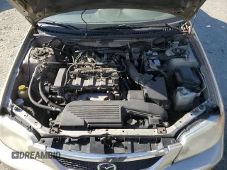 2002 Mazda Protege DX with VIN JM1BJ225520525472, listed as a Copart auction lot 45699915 with 183,457 mi miles and Salvage Title. Bid and sale history available at DreamBid. Image 11.