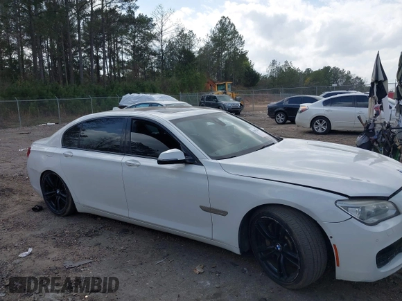2015 BMW 7 Series 750Li with VIN WBAYE8C54FD780951, listed as a IAAI auction lot 41813038 with 103,131 mi miles. Bid and sale history available at carsss.com. Image 13.