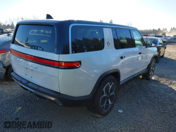 2024 Rivian R1S Adventure with VIN 7PDSGBBA9RN039684, listed as a IAAI auction lot 41558846 with 13,725 mi miles. Bid and sale history available at carsss.com. Image 4.