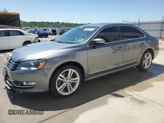 2013 Volkswagen Passat SE with VIN 1VWBN7A31DC093866, listed as a Copart auction lot 56908765 with 195,421 mi miles and Salvage title. Bid and sale history available at DreamBid. Image 1.