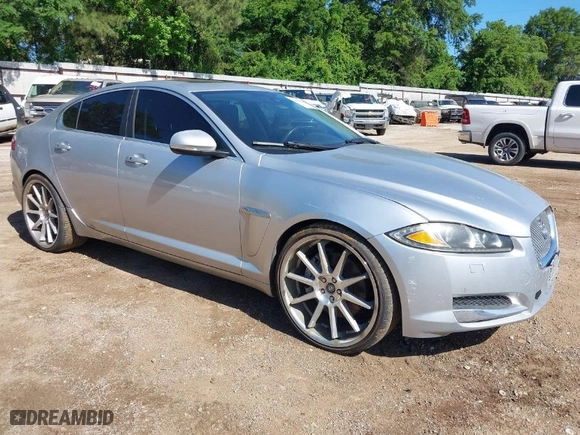 2015 Jaguar XF I4 T Premium with VIN SAJWA0FS6FPU73001, listed as a IAAI auction lot 42092684 with 126,956 mi miles. Bid and sale history available at carsss.com. Image 1.