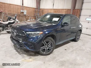 2023 Mercedes-Benz GLC with VIN W1NKM4HB9PF028986, listed as a IAAI auction lot 41611041 with 22,617 mi miles. Bid and sale history available at carsss.com. Image 2.