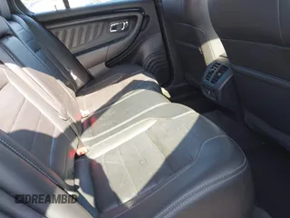 2014 Ford Taurus SHO with VIN 1FAHP2KT8EG123342, listed as a IAAI auction lot 42095390 with 142,957 mi miles. Bid and sale history available at carsss.com. Image 8.