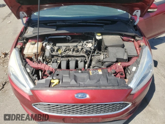 2017 Ford Focus SE with VIN 1FADP3F23HL274056, listed as a Copart auction lot 55743865 with 52,790 mi miles and Salvage title. Bid and sale history available at DreamBid. Image 11.