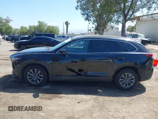 2020 Mazda CX-9 Sport with VIN JM3TCABY8L0407430, listed as a IAAI auction lot 42288490 with 50,317 mi miles and . Bid and sale history available at DreamBid. Image 14.