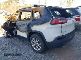 2014 Jeep Cherokee Altitude with VIN 1C4PJMCB5EW120946, listed as a IAAI auction lot 41348100 with Not Provided miles and . Bid and sale history available at DreamBid. Image 3.