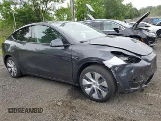 2024 Tesla Model Y с VIN 7SAYGDED2RF040079, выставлен на аукционе Copart как лот 61415675 с пробегом 2 549 миль миль и На запчасти • Non repairable. История ставок и продаж доступна на DreamBid. Изображение 4.