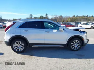 2022 Cadillac XT4 AWD Premium Luxury with VIN 1GYFZDR41NF105299, listed as a IAAI auction lot 41257154 with 34,904 mi miles and . Bid and sale history available at carsss.com. Image 13.