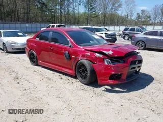2008 Mitsubishi Lancer Evolution GSR with VIN JA3AW86V38U050561, listed as a IAAI auction lot 41879629 with 104,905 mi miles. Bid and sale history available at carsss.com. Image 1.