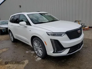 2021 Cadillac XT6 AWD Sport z VIN 1GYKPHRS4MZ209583, wystawiony jako Copart lot #66305562 z przebiegiem 19 570 mil mil oraz . Historia ofert i sprzedaży dostępna na DreamBid. Obrazek 9.
