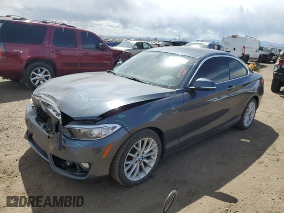 2015 BMW 2 Series 228i with VIN WBA1F9C57FVW98744, listed as a Copart auction lot 50383504 with 68,799 mi miles. Bid and sale history available at carsss.com. Image 1.