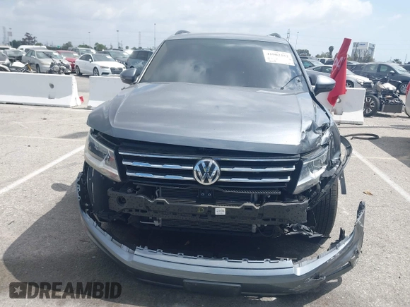 2020 Volkswagen Tiguan SE with VIN 3VV3B7AX9LM061569, listed as a IAAI auction lot 41902252 with 33,079 mi miles and . Bid and sale history available at DreamBid. Image 12.