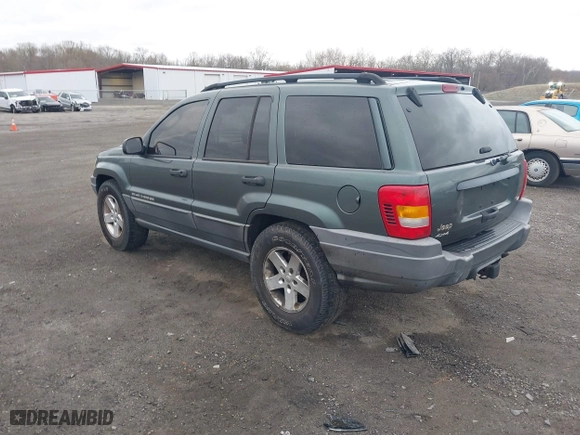 2002 Jeep Grand Cherokee Laredo with VIN 1J4GW48NX2C151430, listed as a IAAI auction lot 41886769 with 222,795 mi miles. Bid and sale history available at carsss.com. Image 3.