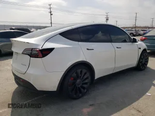 2022 Tesla Model Y Performance with VIN 7SAYGDEF6NF493231, listed as a Copart auction lot 52336284 with 37,116 mi miles and Salvage title. Bid and sale history available at DreamBid. Image 3.