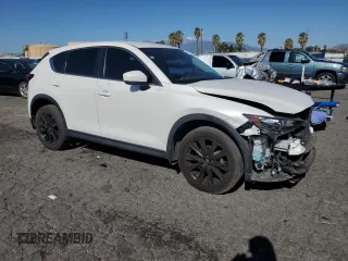 2021 Mazda CX-5 Sport with VIN JM3KFABM4M1321480, listed as a Copart auction lot 46187805 with 66,382 mi miles and Salvage Title. Bid and sale history available at carsss.com. Image 4.