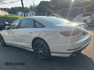 2020 Audi S8 z VIN WAU8SAF82LN011960, wystawiony jako Copart lot #59629095 z przebiegiem 58 167 mil mil oraz Tytuł czysty. Historia ofert i sprzedaży dostępna na DreamBid. Obrazek 3.