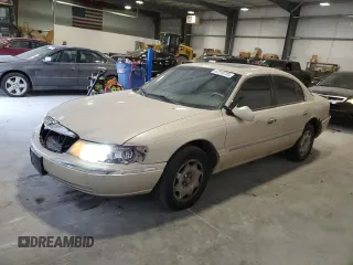 2002 Lincoln Continental with VIN 1LNHM97VX2Y694578, listed as a Copart auction lot 42245705 with 195,236 mi miles and Salvage Title. Bid and sale history available at carsss.com. Image 1.