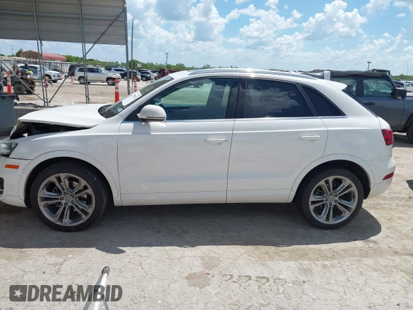2015 Audi Q3 Prestige with VIN WA1GFCFS1FR007092, listed as a IAAI auction lot 42588730 with 85,290 mi miles and . Bid and sale history available at DreamBid. Image 14.