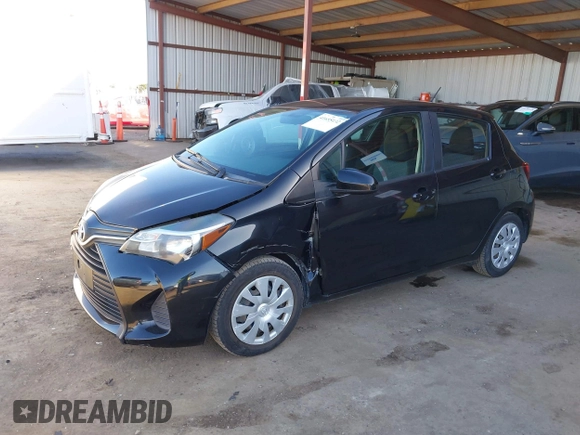 2015 Toyota Yaris L with VIN VNKKTUD32FA030980, listed as a IAAI auction lot 41655132 with 106,826 mi miles and . Bid and sale history available at carsss.com. Image 6.