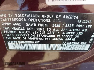 2012 Volkswagen Passat SE z VIN 1VWBN7A3XCC097252, wystawiony jako IAAI lot #42373075 z przebiegiem 134 733 mil mil oraz . Historia ofert i sprzedaży dostępna na DreamBid. Obrazek 9.